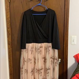 Beautiful long squine dress with a black top.